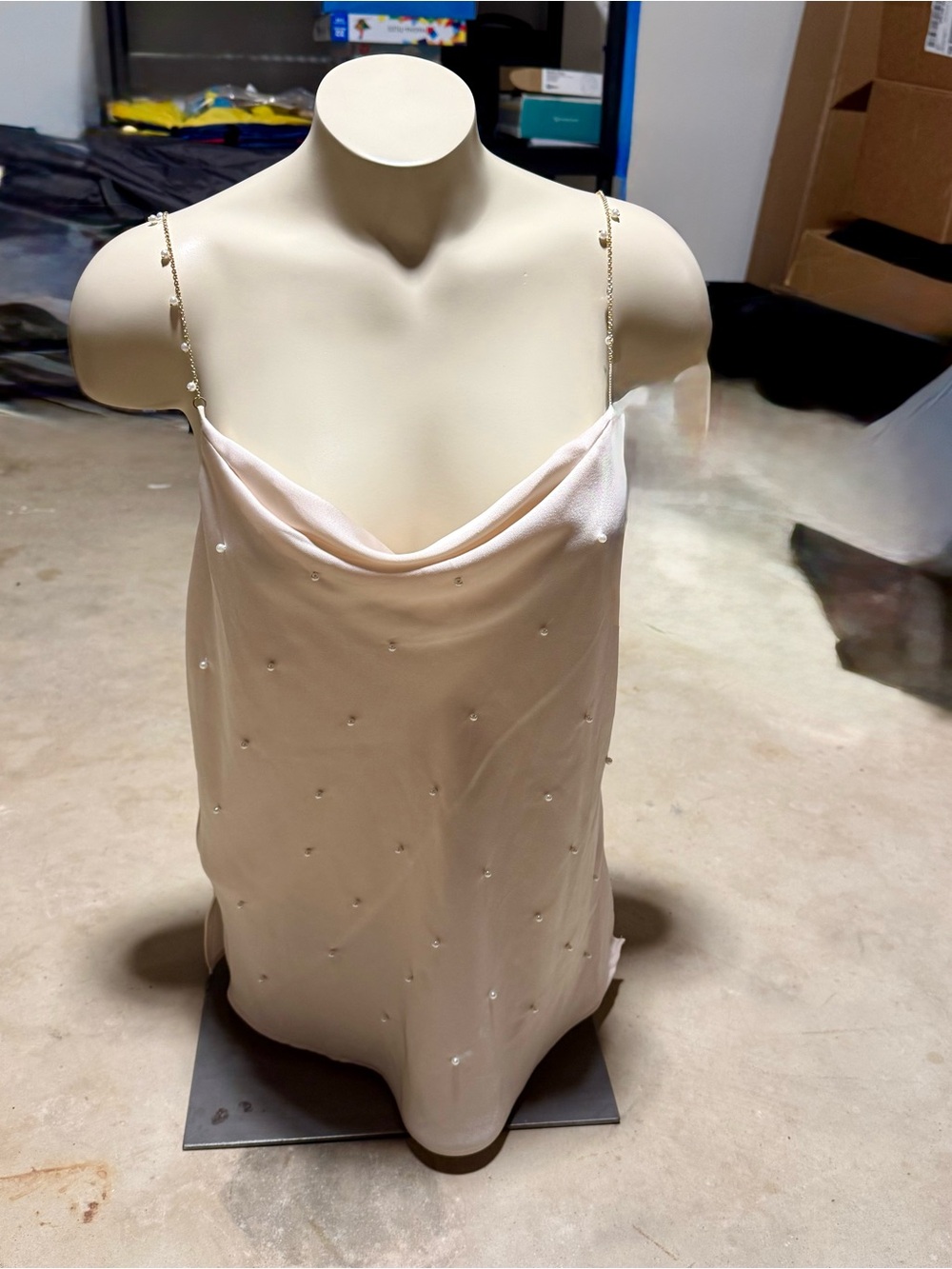 Cream and pearl top